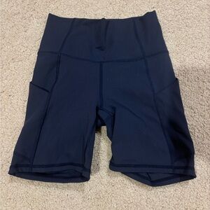 Fabletics navy biker shorts with pockets